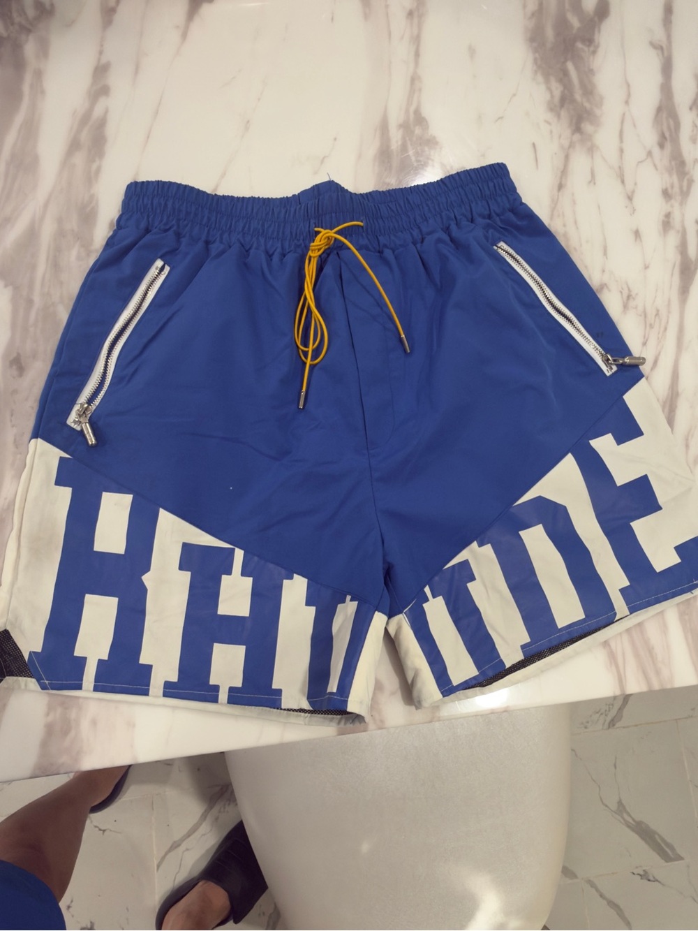 Rhude Blue & White Logo Swim Shorts with Yellow Drawstring